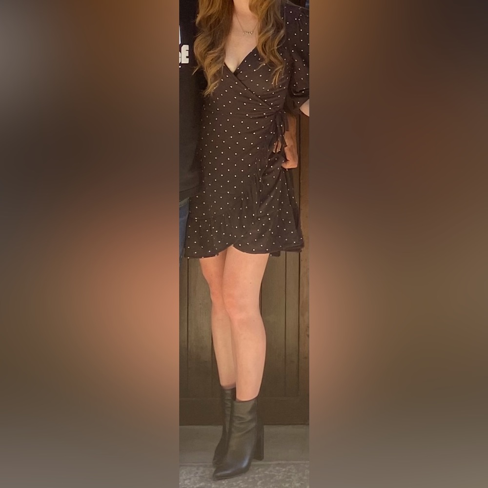 Black wrap dress with tan polka dots